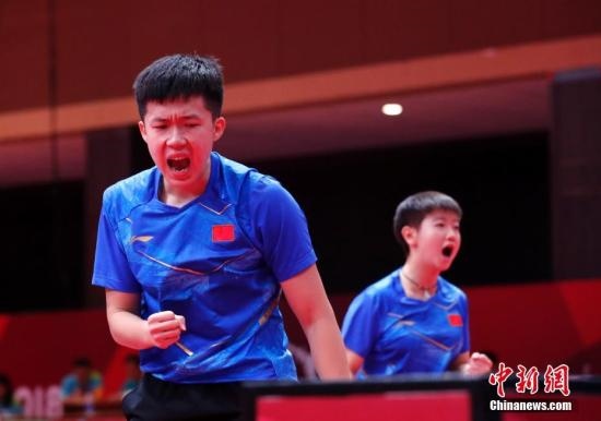 資料圖：雅加達亞運會，王楚欽/孫穎莎奪得混雙冠軍。 <a target='_blank' href='/'>中新社</a>記者 劉關(guān)關(guān) 攝