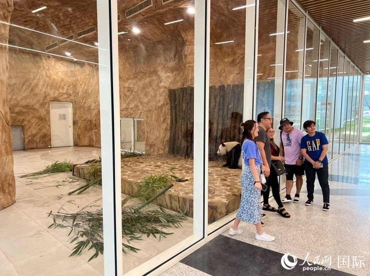 當(dāng)?shù)赜慰团c“四?！焙嫌?。人民網(wǎng)記者 張志文攝