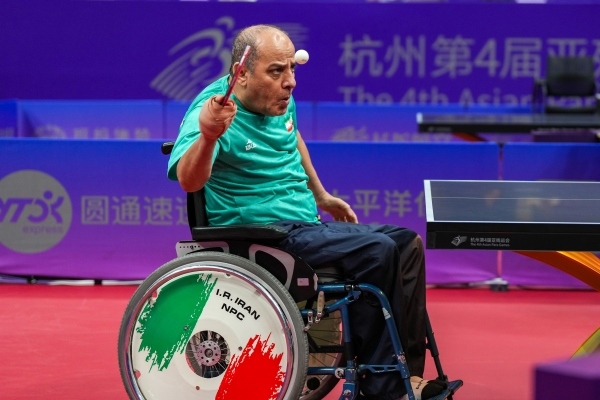10月23日，杭州第4屆亞殘運會乒乓球男子單打Class2小組循環(huán)賽舉行。圖為伊朗隊選手哈?！ず嗁M尚在比賽中。圖片來源：杭州亞殘組委會