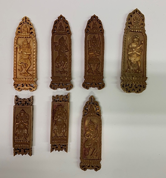 木雕牌飾（暫定名）。國(guó)家文物局供圖