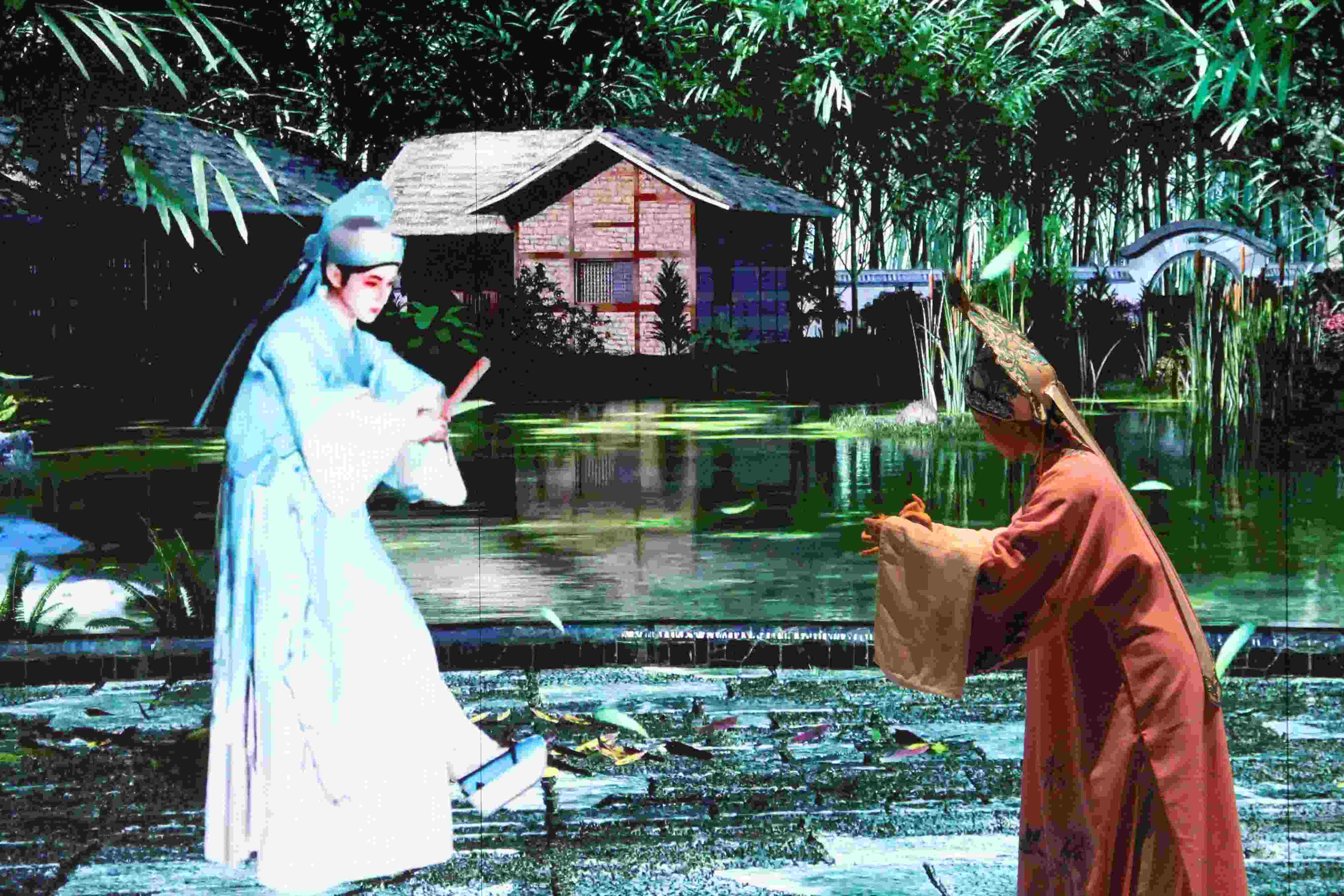 真人演員與虛擬人演員在“元啟金陵”南京數(shù)字文化客廳出演《梁山伯與祝英臺》經(jīng)典選段。受訪者供圖