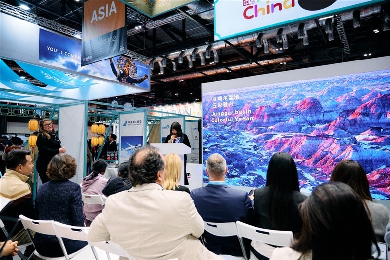  “中國館”新疆旅游推介會現(xiàn)場介紹。楊浩鵬攝