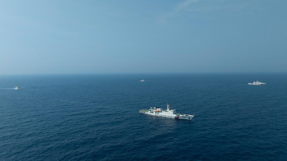 4月22日，中越海警艦艇編隊(duì)在北部灣海域開展聯(lián)合巡邏。（中國海警供圖）